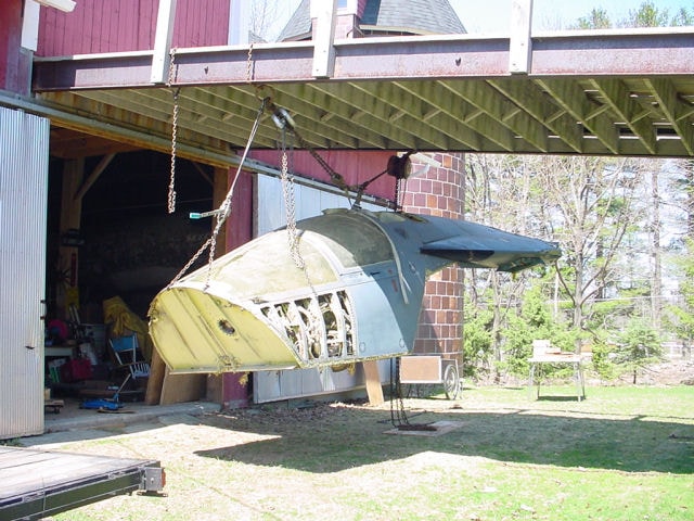 Restored cockpit filled with original instruments, controls, panels and distinctive F-111 hardware