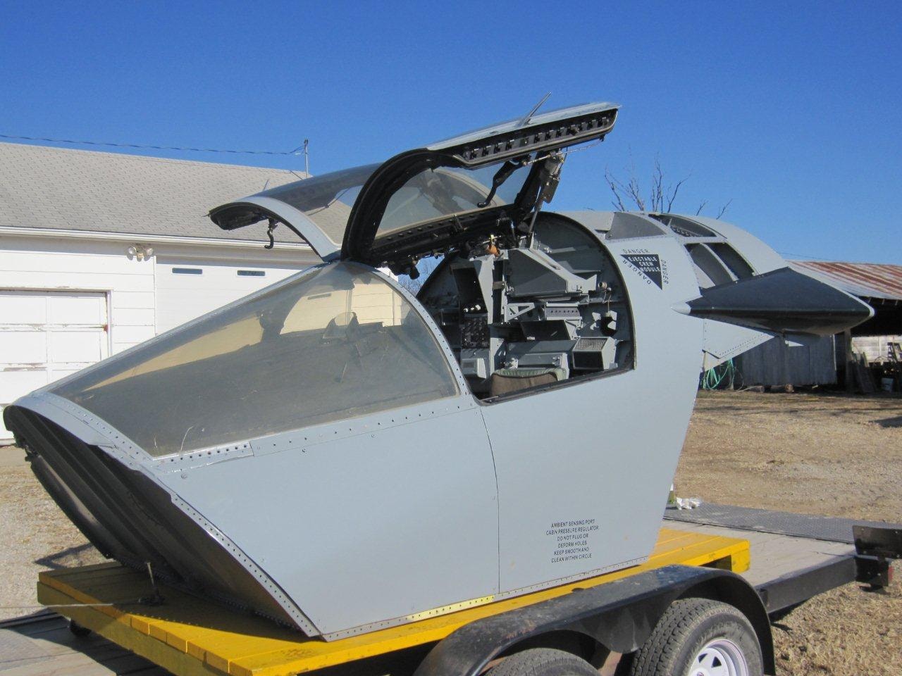 Cockpit in dusty and incomplete condition with original instruments, panels and controls visible